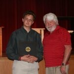 Jim Lindsey, Scoutmaster, presents Big Rapids Senior Ian Ensink with the Harold Boerma Eagle Scout Scholarship.