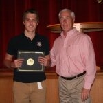 Bill Scheible, Scholarship Committee member and MCCF Emeriti, presents Big Rapids Senior, Alex Conati, the Jacob & Gertude Van Dyke Scholarship.