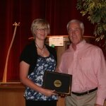 Bill Scheible, Scholarship Committee member and MCCF Emeriti presents Big Rapids Senior, Emalie Schuberg,  the Linda Willette Class of 1974 Scholarship.